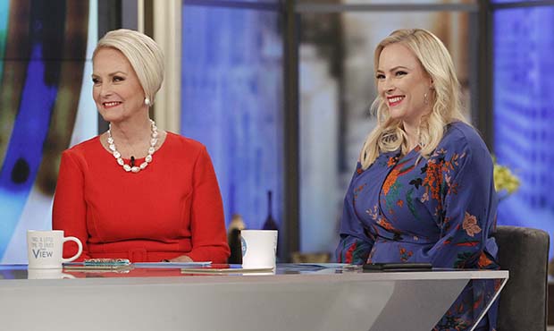 This image released by ABC shows, Cindy McCain, left, appearing with her daughter, co-host Meghan M...