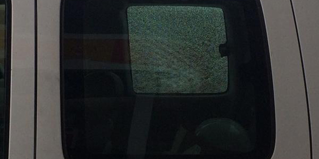 The rear back window of a truck was hit on Wednesday while driving on Interstate 10. (Cooper Rummel...