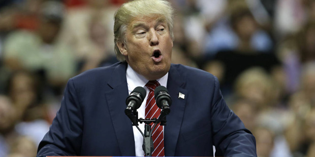 Republican presidential candidate Donald Trump speaks to supporters during a campaign event in Dall...