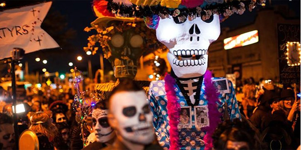 Attendees of Tucson Ariz.'s All Souls Procession Weekend dress up to celebrate and honor the dead. ...