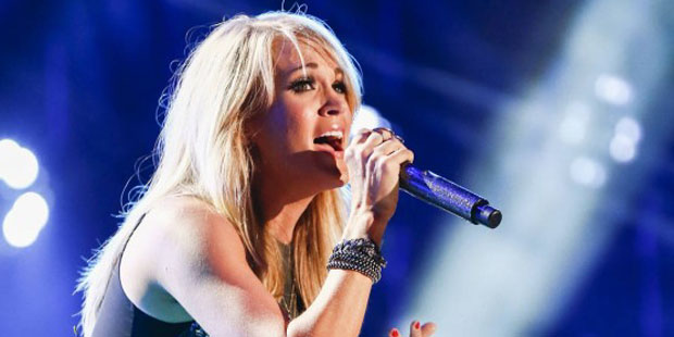 FILE – In this June 13, 2015 file photo, Carrie Underwood performs at LP Field at the CMA Mus...