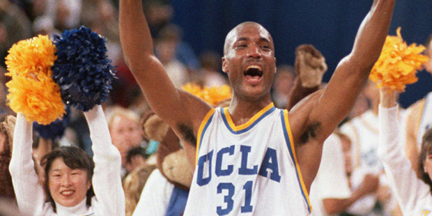 In this April 3, 1995, file photo, UCLA's Ed O'Bannon celebrates after his team won the NCAA champi...