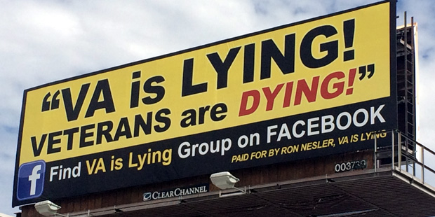 The billboard erected by the VA Is Lying organization reads, "VA is lying, Veterans are dying!" The...