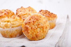 Savory Cheese And Bacon Muffins On The White Table ** Note: Shallow depth of field
