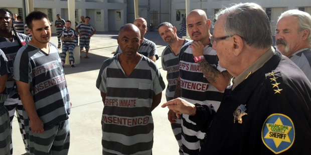 Maricopa County Sheriff Joe Arpaio (left) speaks with veteran inmates currently detained at a Maric...