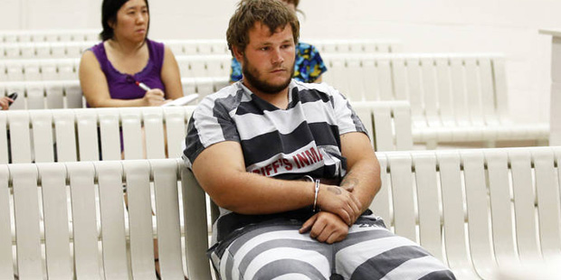 Leslie Allen Merritt Jr., waits to make his initial appearance before a judge at the Maricopa Count...