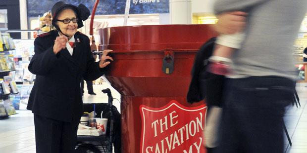 In this Nov. 15, 2014 photo, 92 year-old Salvation Army bell ringer Esther Rahenkamp, of Avon Park,...