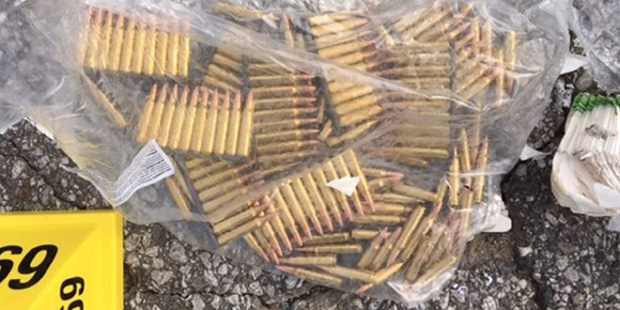 This photo provided by the San Bernardino County Sheriff's Department shows ammunition carried by s...
