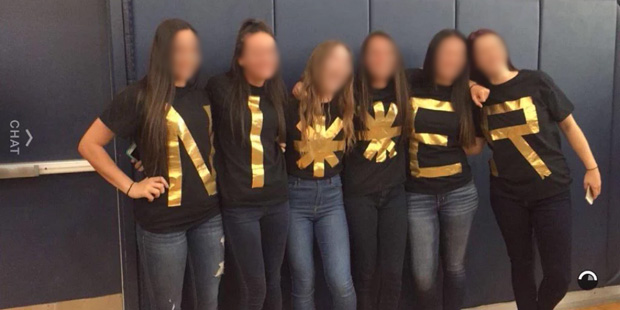 Six unidentified Desert Valley High School students spell out "N-I-*-*-E-R" in T-shirts in a viral ...