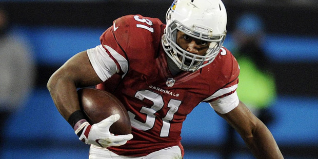 Arizona Cardinals' David Johnson runs past Carolina Panthers' Shaq Green-Thompson during the first ...