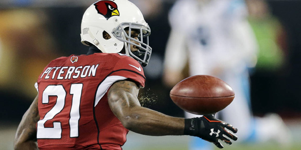 Arizona Cardinals' Patrick Peterson can't handle a punt during the first half the NFL football NFC ...