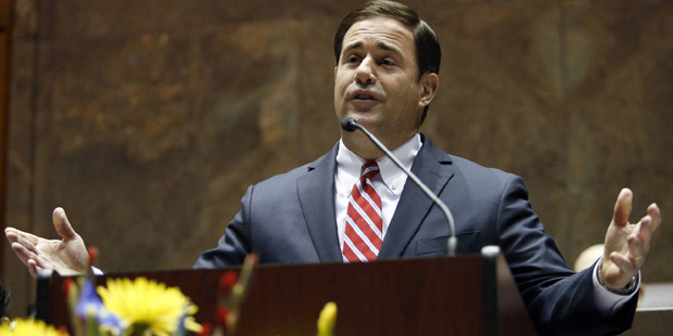 Arizona Governor Doug Ducey presents his State of the State address, Monday, Jan. 11, 2016, in Phoe...