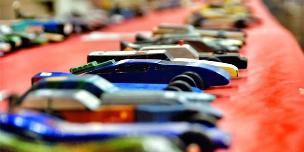 A line of Pinewood Derby cars are lined up, ready to race. (Facebook/Lincoln Pinewood Derby)...