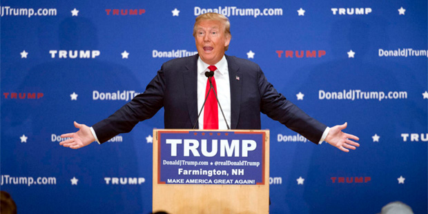 Republican presidential candidate Donald Trump speaks during a campaign stop at Farmington High Sch...