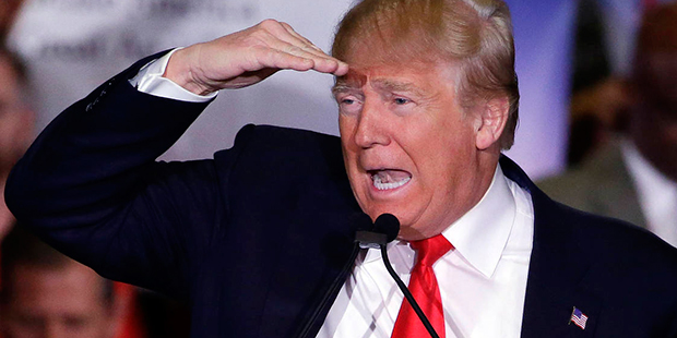 Republican presidential candidate Donald Trump looks out onto the crowd during a rally Tuesday, Feb...