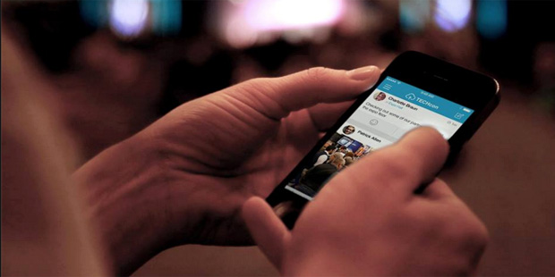 A user showcases a mobile application designed by DoubleDutch, a San Francisco-based company that p...