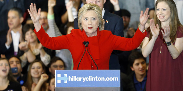 Democratic presidential candidate Hillary Clinton speaks in front of former President Bill Clinton ...