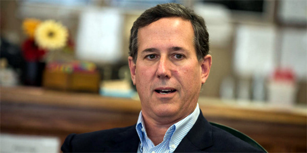 In this photo taken Jan. 19, 2016, former Pennsylvania Sen. Rick Santorum meets with voters in Gree...