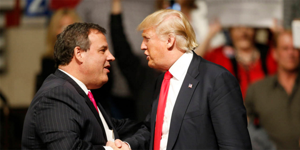 New Jersey Gov. Chris Christie, left, greets Republican presidential candidate Donald Trump, right,...