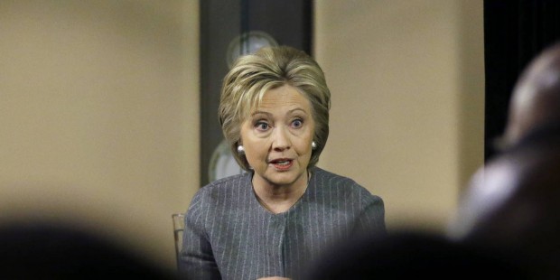 Democratic presidential candidate Hillary Clinton speaks with African American ministers, Saturday,...