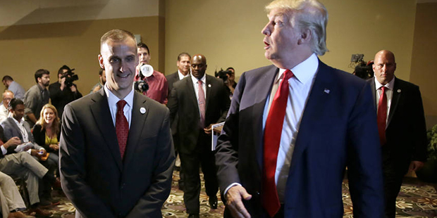 FILE - In this Aug. 25, 2015 file photo, Republican presidential candidate Donald Trump, right, wal...
