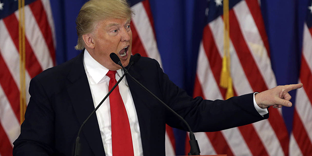 Republican presidential candidate Donald Trump speaks during a news conference at the Trump Nationa...