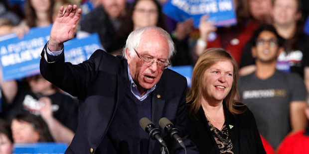 Democratic presidential candidate Sen. Bernie Sanders, I-Vt., with his wife Jane Sanders, waves as ...