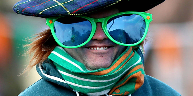 A spectator arrives to watch the St Patrick's Day parade on the streets of Dublin  Thursday March 1...