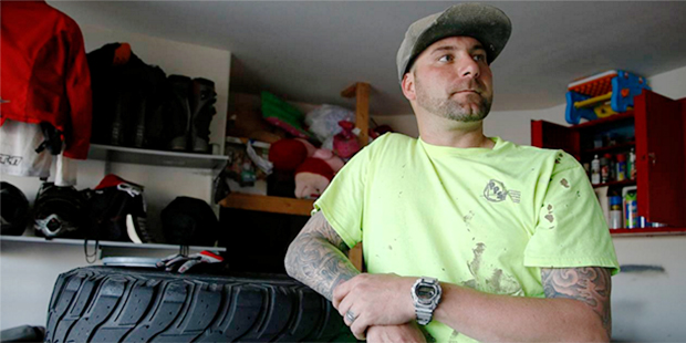 Drayton Witt pauses for a moment at his home Wednesday, Feb. 10, 2016, in Surprise, Ariz. An Arizon...