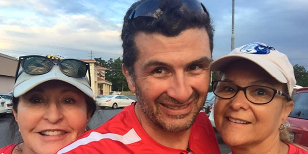 Jason Romero, middle, and two supporters. (Facebook Photo)...