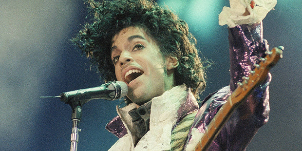 Rock singer Prince performs at the Forum in Inglewood, Calif., during his opening show, Feb. 18, 19...