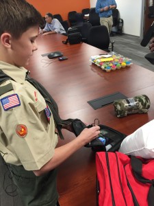 Aidan McClendon showing the duffel bags. (KTAR Photo/Brian Rackham)