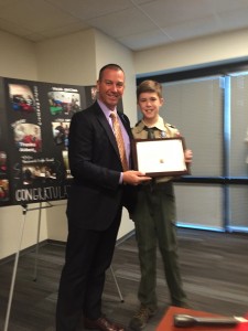 Aidan McClendon with Arizona DCS Director Greg McKay (KTAR Photo/Brian Rackham)