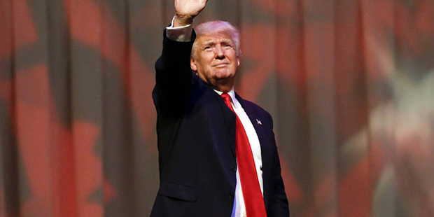 Republican presidential candidate Donald Trump waves a rally at The Palladium in Carmel, Ind., Mond...
