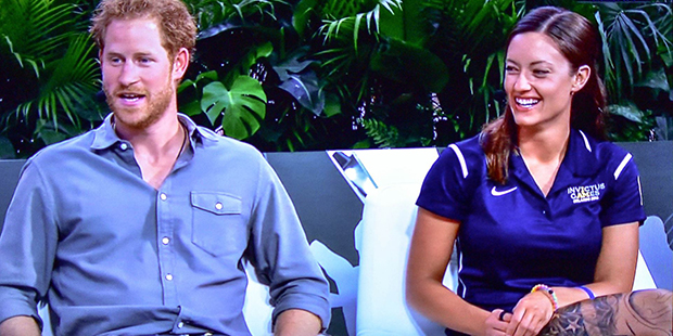 U.S. Army Sgt. Elizabeth Marks (right) appears on ESPN with Prince Harry. (Screenshot)...
