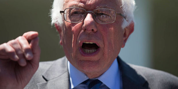 Democratic presidential candidate Sen. Bernie Sanders, I-Vt. speaks to reporters outside the White ...