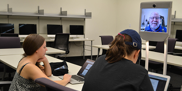 Chief Eric Newton teaches his students with his telepresence robot on April 1, 2016 in the Walter C...