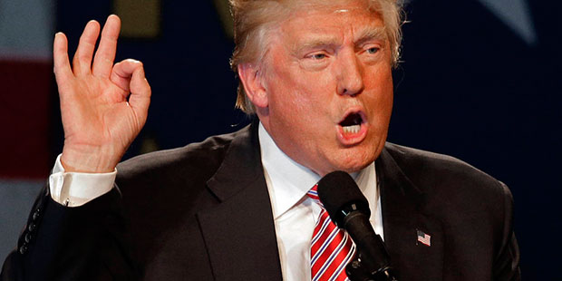In this photo taken June 14, 2016, Republican presidential candidate Donald Trump speaks during a c...