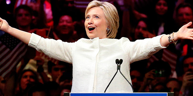 Democratic presidential candidate Hillary Clinton gestures as she greets supporters at a presidenti...