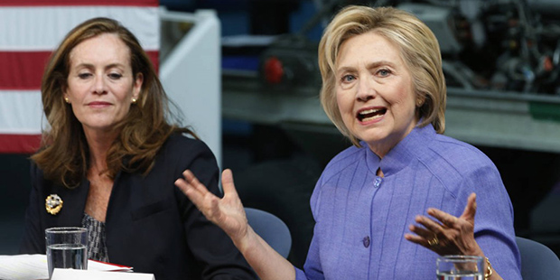Democratic Presidential candidate Hillary Clinton, accompanied by Virginia first lady Dorothy McAul...