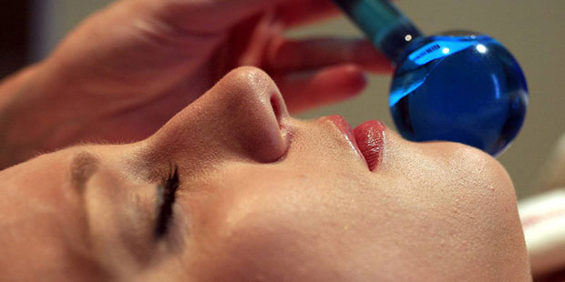 In this June 3, 2009, file photo, a customer receives a facial massage. (AP Photo/Mark Lennihan, Fi...