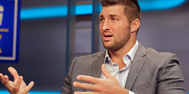Former Heisman Trophy winning quarterback Tim Tebow. (AP Photo/Chuck Burton)...