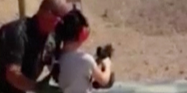 In this Aug. 25, 2014 image made from video provided by the Mohave County Sheriff Department, firin...