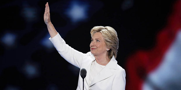 Democratic presidential nominee Hillary Clinton waves to delegates before speaking during the final...