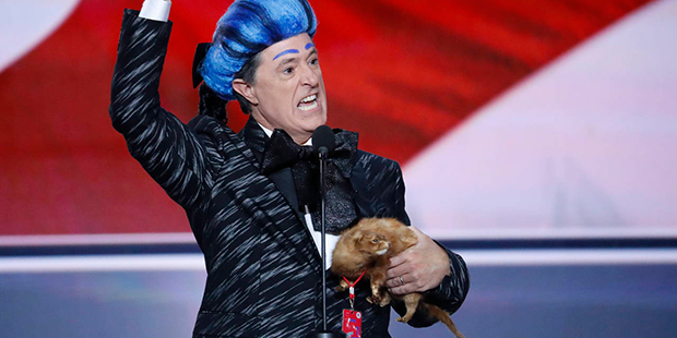 Comedian Stephen Colbert clowns around on the stage at the Republican National Convention in Cleveland, Sunday, July 17, 2016. (AP Photo/J. Scott Applewhite)