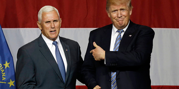 Indiana Gov. Mike Pence joins Republican presidential candidate Donald Trump at a rally in Westfiel...