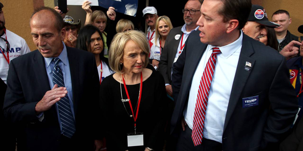 Phoenix council member Sal DiCiccio, left, and state treasurer Jeff DeWitt gets into an argument wi...