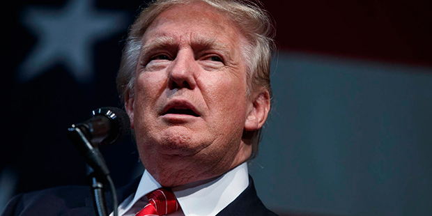 Republican presidential candidate Donald Trump speaks during a campaign rally at Crown Arena, Tuesd...