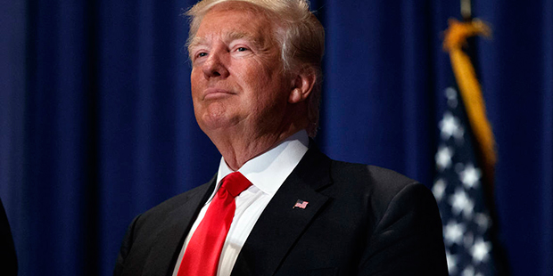Republican presidential candidate Donald Trump pauses during a campaign rally, Friday, Aug. 12, 201...