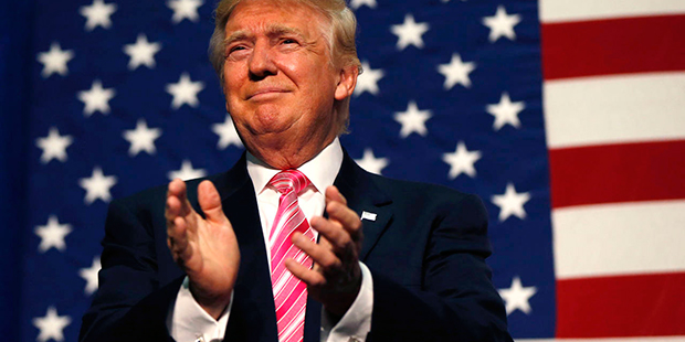 Republican presidential candidate Donald Trump arrives to speak at a campaign rally in Fredericksbu...